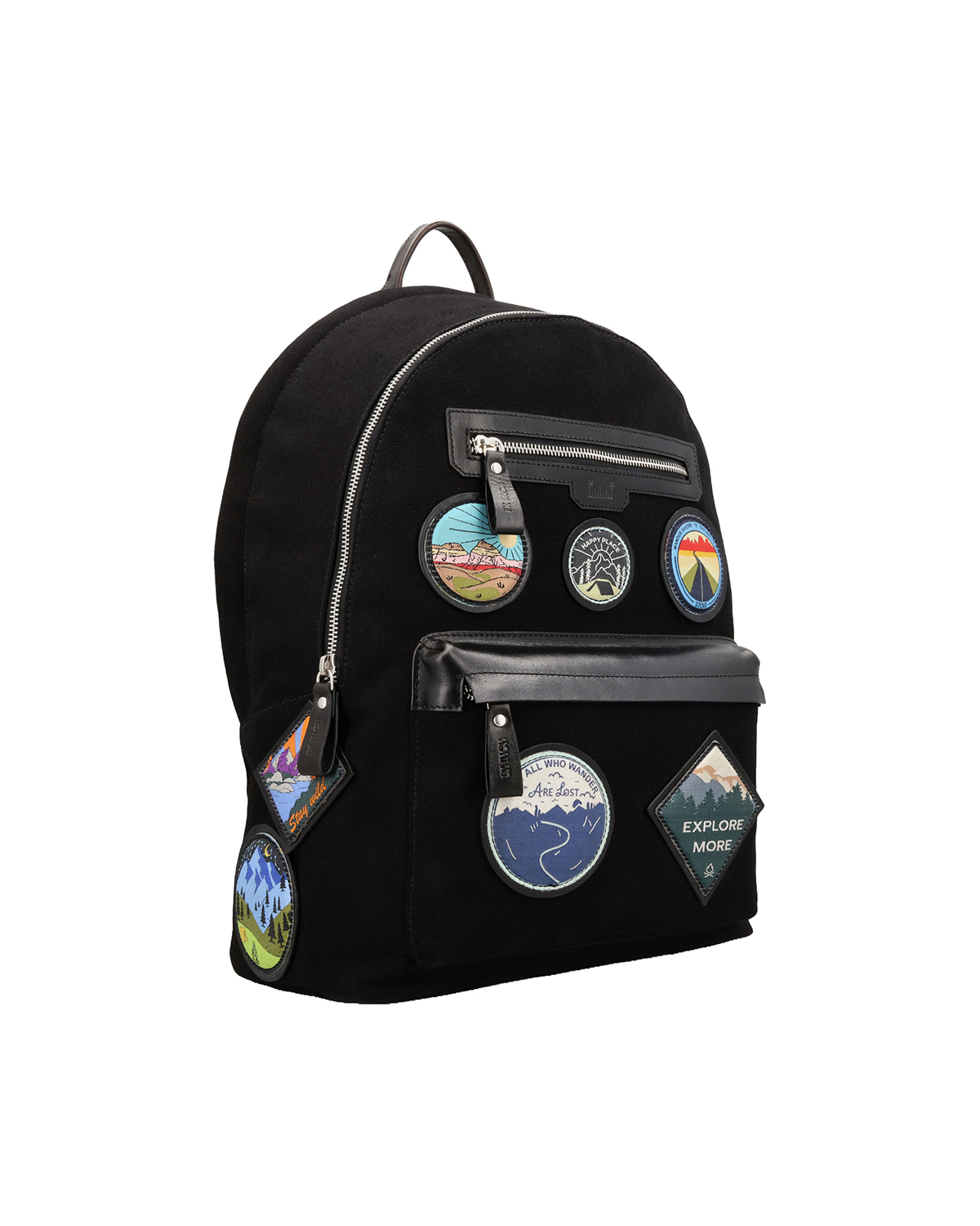Black canvas and reclaimed leather backpack with travel-inspired embroidered leather patches, two zip pockets for a passport, iPad, earphones, and small accessories.