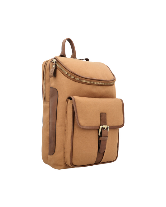 Tan canvas and reclaimed leather mini backpack with magnetic flap, antique buckle loops, front pocket, iPad sleeve, and single shoulder strap.