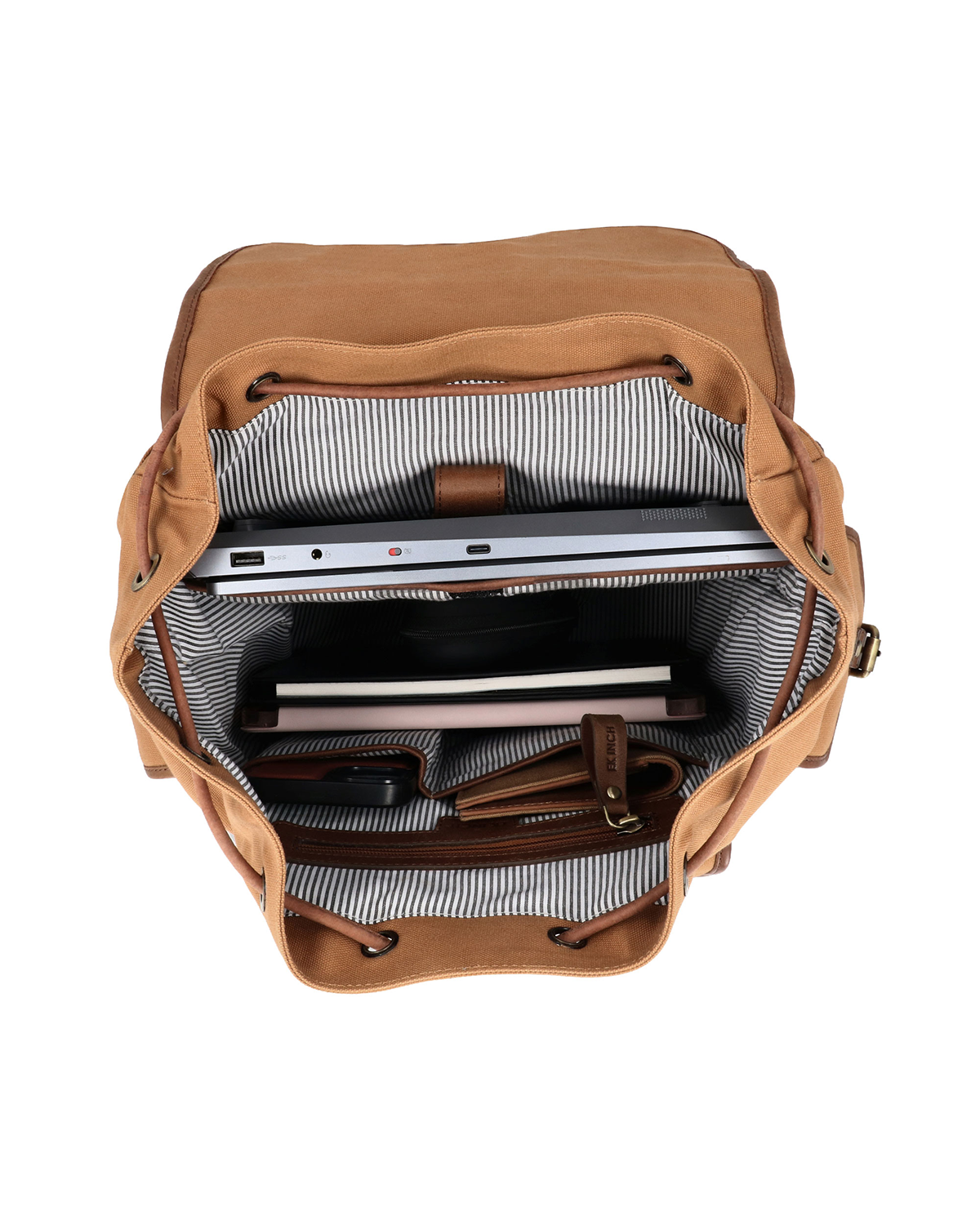studio ek inch tan canvas and leather drawstring backpack with laptop compartment, separate compartment for laptop, apple iPad, phone, wallet, pen, charger. padded inside to keep gadget safe and secure. 