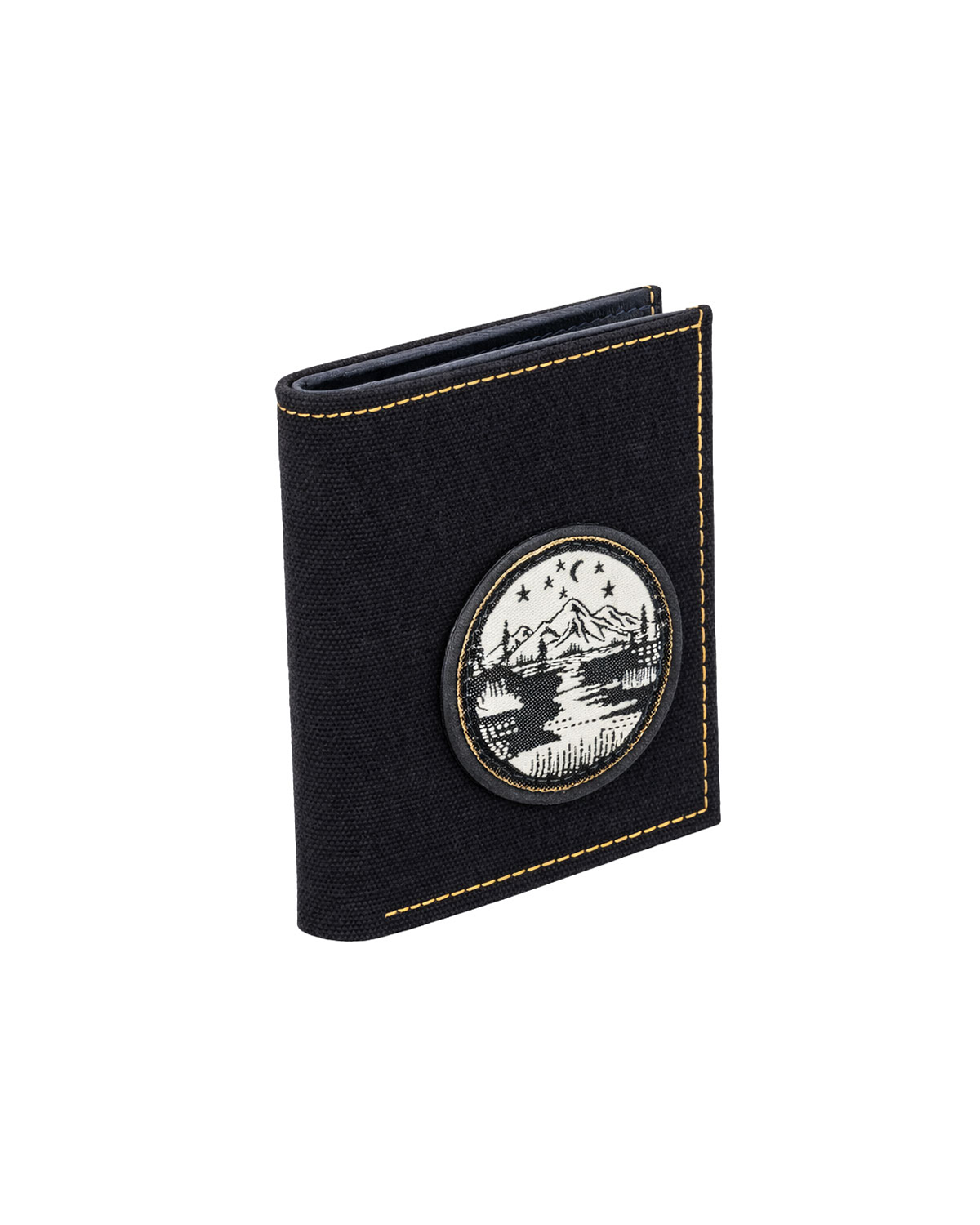 Black canvas and leather mini wallet for men featuring a travel-inspired embroidered mountain patch, designed as a compact everyday wallet with handcrafted details. This premium men's wallet from a premium leather bag brand of India is ideal for travel lovers and makes a thoughtful birthday gift, anniversary gift, or festive gift for him.