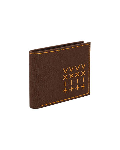Brown canvas and leather billfold wallet for men with handcrafted embroidery details, designed as a slim everyday wallet with a classic silhouette. This premium men's wallet from a premium leather bag brand of India makes an ideal birthday gift, anniversary gift, or festive gift for him.