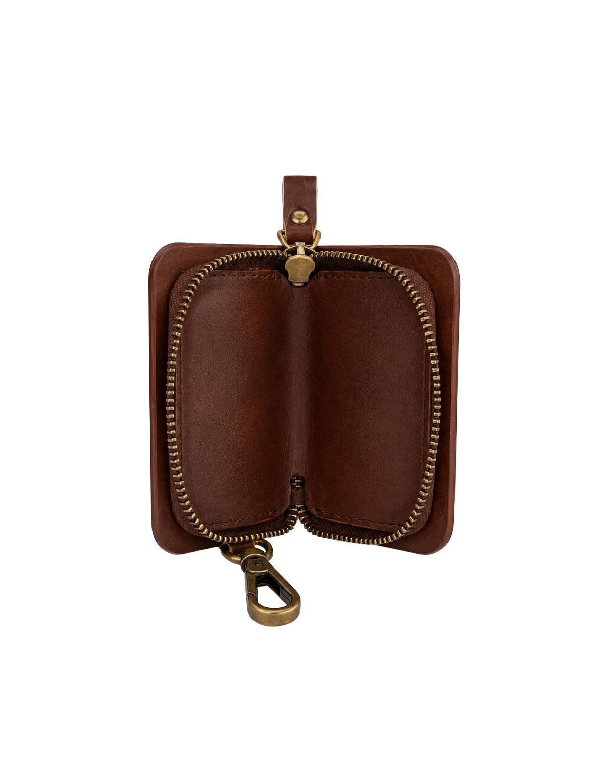Brown leather car key case with zipper closure and metal key ring, designed to securely organize car keys and everyday essentials. This premium leather key holder from a premium leather bag brand of India is compatible with popular models such as Mahindra Thar, Scorpio, XUV700, Tata Safari, Harrier, Nexon, Hyundai Creta, Maruti Suzuki Brezza, Kia Seltos, and Toyota Fortuner, making it a thoughtful gift for men.