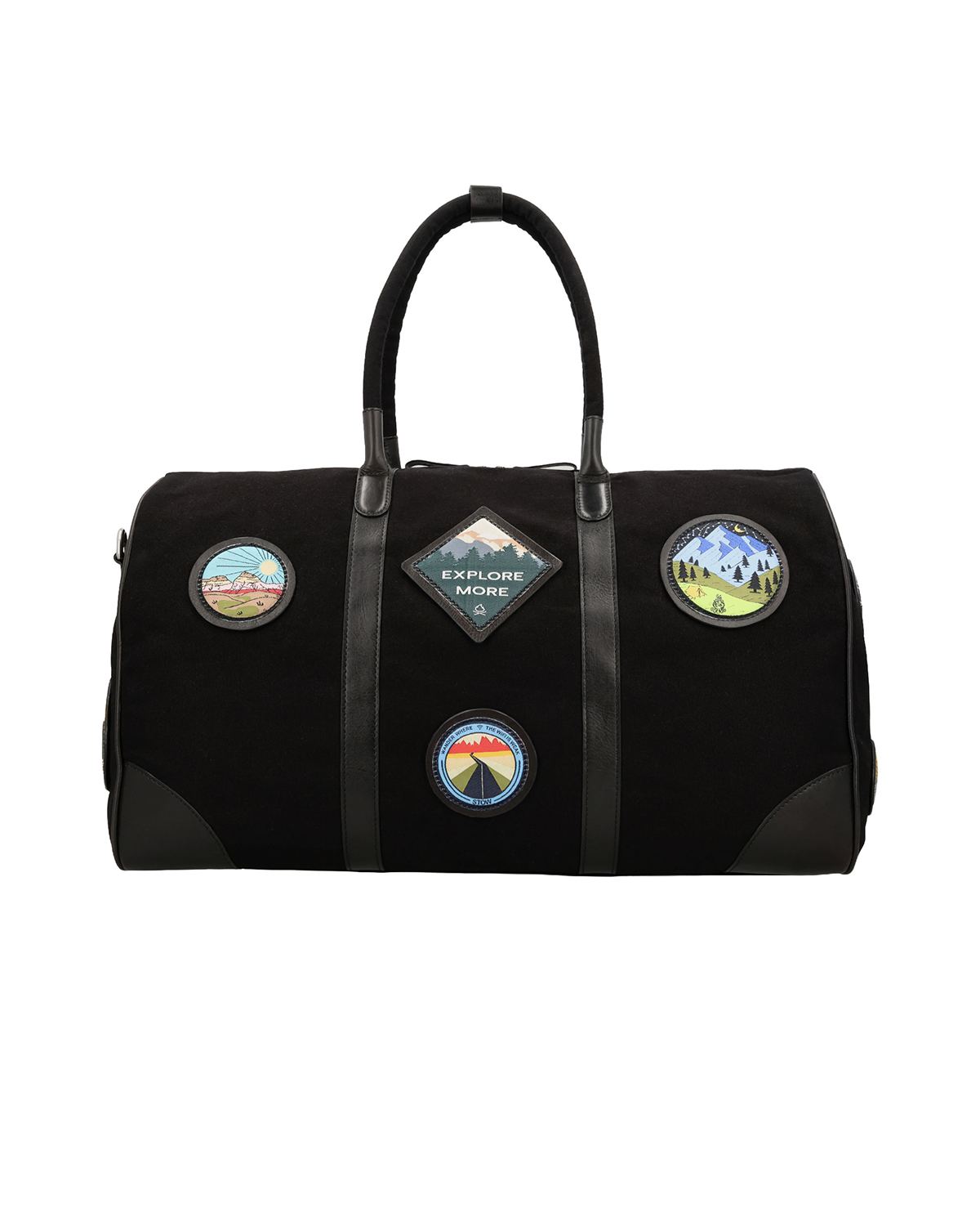 Front view of the Studio Ek Inch Kasol weekender duffle bag in black canvas and reclaimed leather, featuring handcrafted travel-inspired patches and spacious interiors. This premium canvas and leather hold all bag is designed for weekend getaways, airport travel and overnight trips by one of India's premium bag brands.