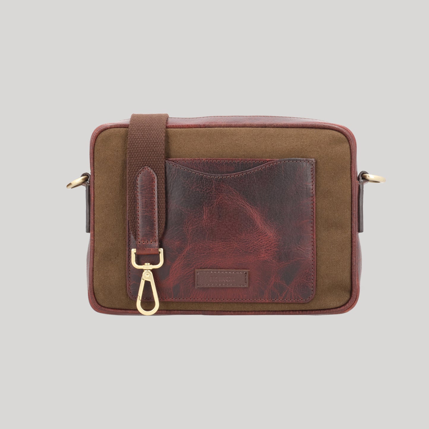 canvas and leather sling bag