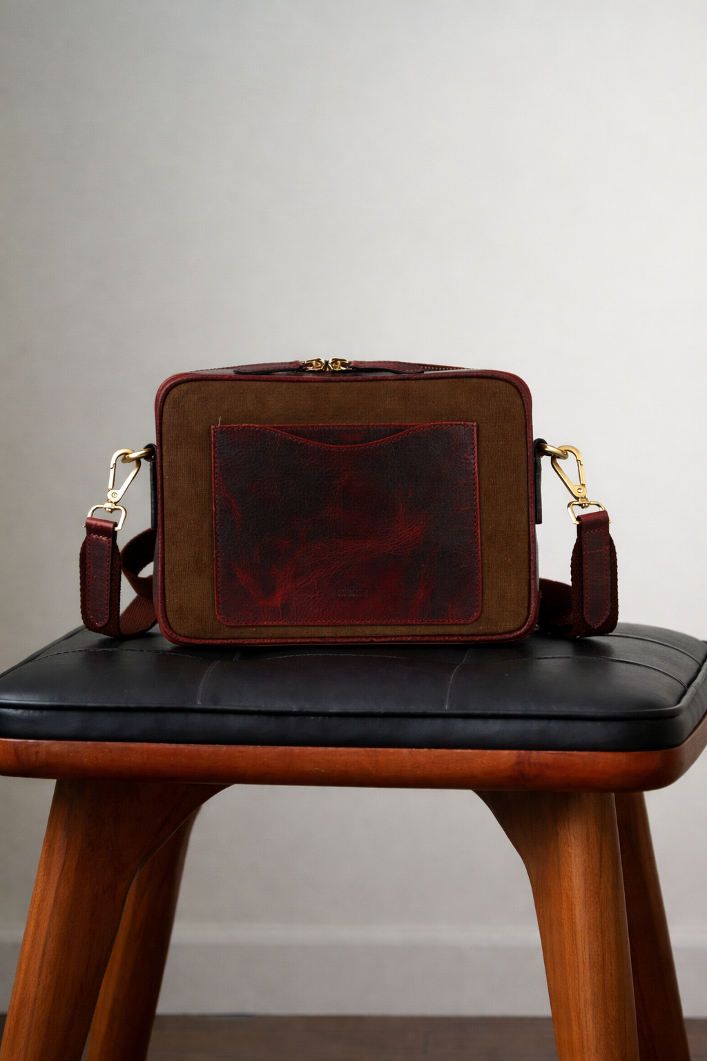 canvas and leather sling bag