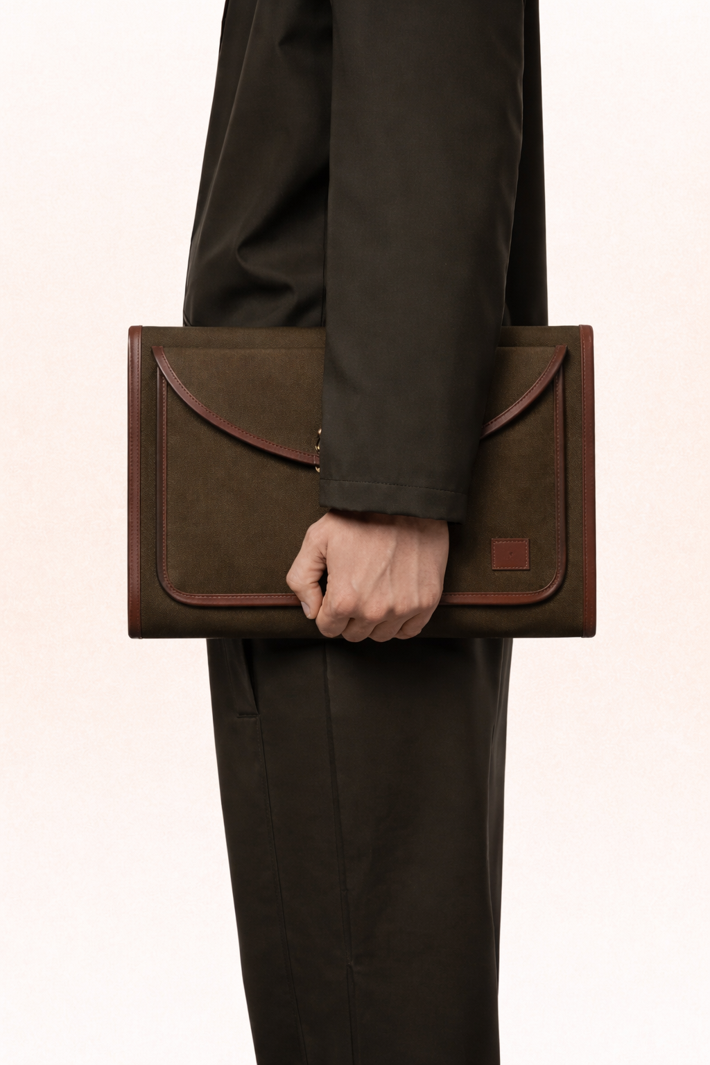 Dark brown leather laptop sleeve with canvas body, Passage Sleeve by Studio Ek Inch, designed for 13–16 inch laptops and iPad.