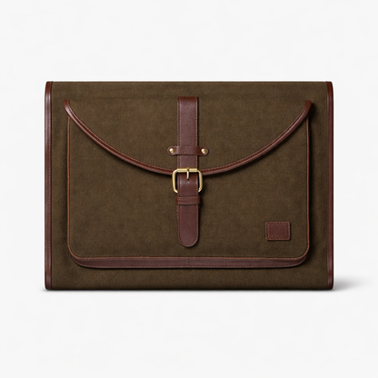 Dark brown leather and canvas laptop sleeve with buckle closure, Passage Sleeve designed for 13–16 inch laptops and iPad. studio one inch, studio ek inch, studio 1 inch