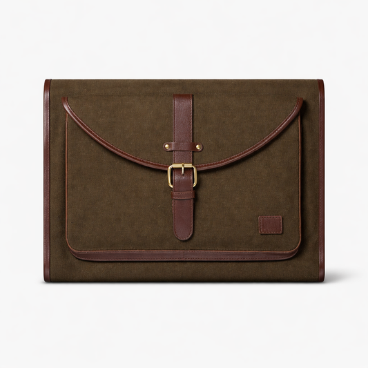 Dark brown leather and canvas laptop sleeve with buckle closure, Passage Sleeve designed for 13–16 inch laptops and iPad. studio one inch, studio ek inch, studio 1 inch