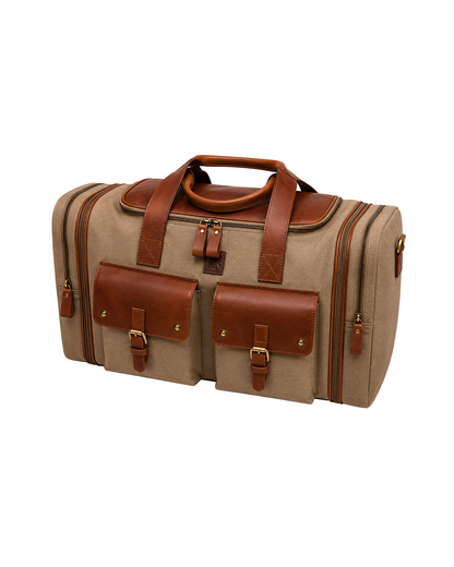 Studio Ek Inch Ladakh expandable weekender bag in canvas and reclaimed leather with front utility pockets, expandable storage and spacious compartments for clothes and travel essentials.