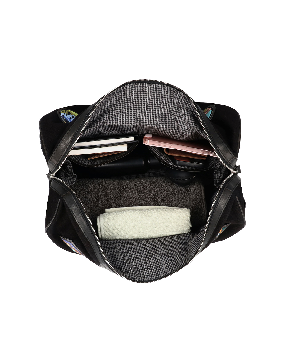 Top view of the Studio Ek Inch Kasol Weekender duffle bag in canvas and reclaimed leather, showcasing its spacious main compartment with dedicated space for clothes, books and travel essentials. Designed as a premium weekender bag for men, it is ideal for overnight stays, airport travel and weekend getaways.
