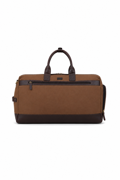 Rear view of the Studio Ek Inch Transit Weekender duffle bag in durable canvas and reclaimed leather, featuring a large zip pocket for quick access to travel essentials. Designed as a premium weekender bag for men, this spacious holdall is ideal for airport travel, weekend getaways and overnight trips.
