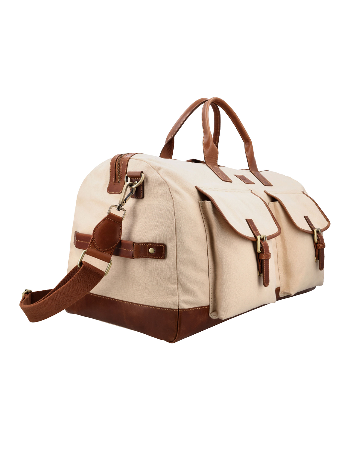 Three-quarter view of the Studio Ek Inch Rohtang canvas and leather duffle bag featuring reclaimed leather trims, front utility pockets and a detachable shoulder strap. A premium holdall bag for travel and weekend getaways.