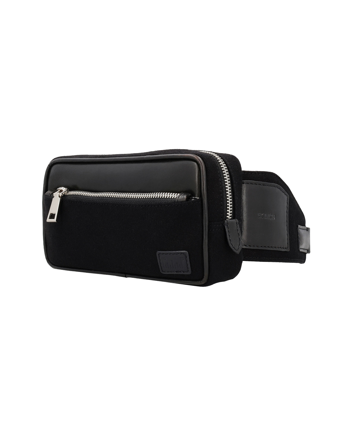 Black Studio Ek Inch Urban Traveller canvas and leather sling bag for men featuring spacious compartments for a mobile phone, wallet and daily essentials. Handcrafted as a travel crossbody bag with a clean, minimalist aesthetic inspired by life on the move.